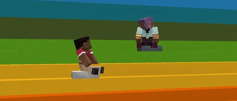 Zuri et Efe assis sur des coussins posés sur des escaliers en béton arc-en-ciel